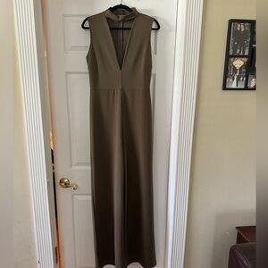 Plunge neck line olive wide leg jumpsuit/romper.
